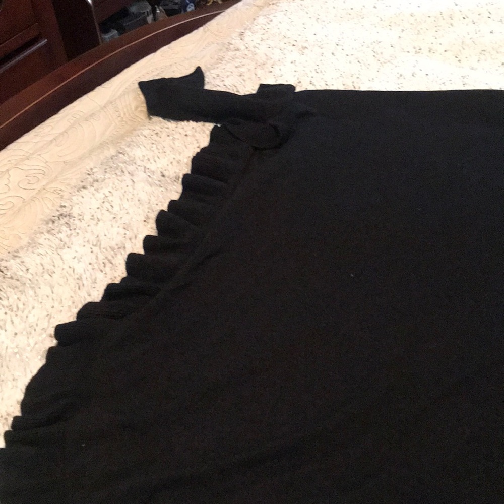Ruffle poncho with sleeves